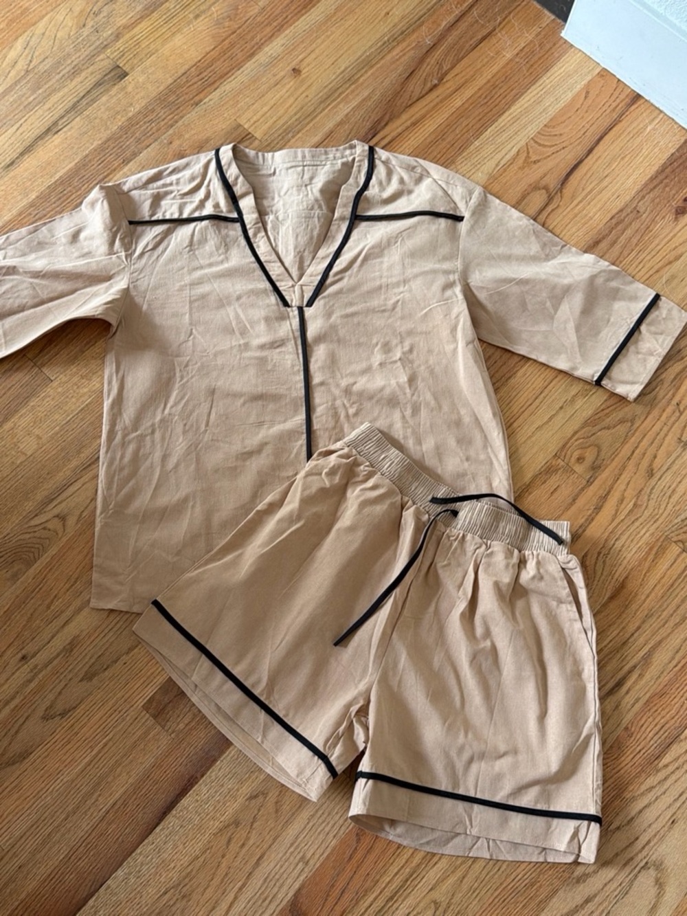 Beige Two-Piece Lounge Set with Black Piping
